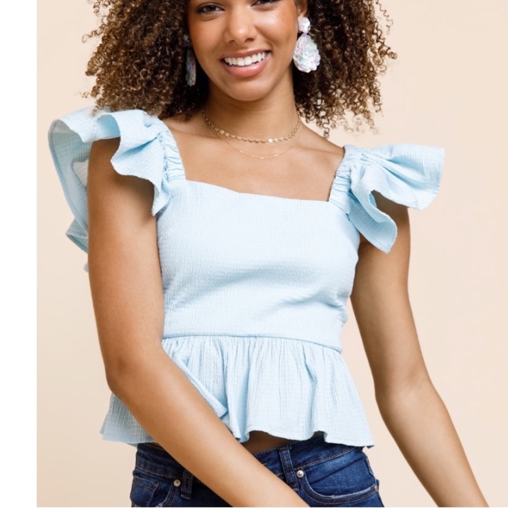 Francesca’s Anissa Peplum Bow Back Blouse